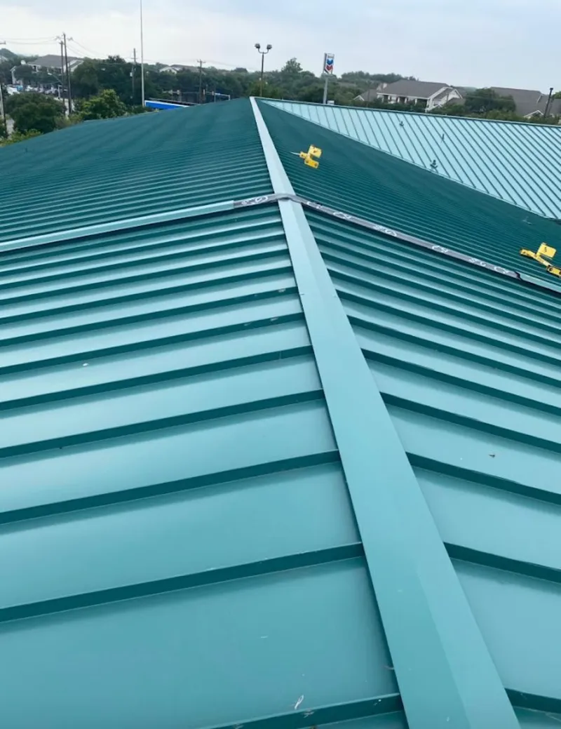 Green commercial metal roof ridge and valley for Metal Roof Repair in Bridgton
