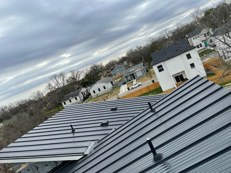 Standing seam metal roof panels with vents for Skylight Repair in Bridgton